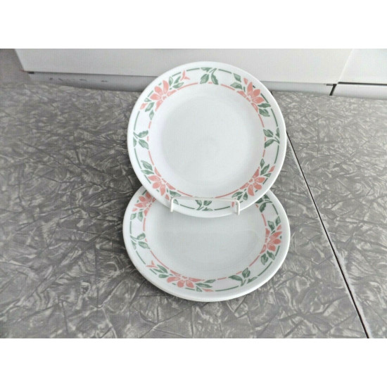 CORELLE 4 PC. BREAD/DESSERT PLATE SET in the "ISLAND BREEZE" FLORAL PATTERN