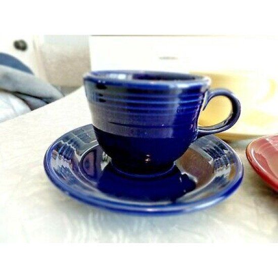 FIESTAWARE MULTI COLORED 8 PC. FIESTA CUP AND SAUCER SETS.